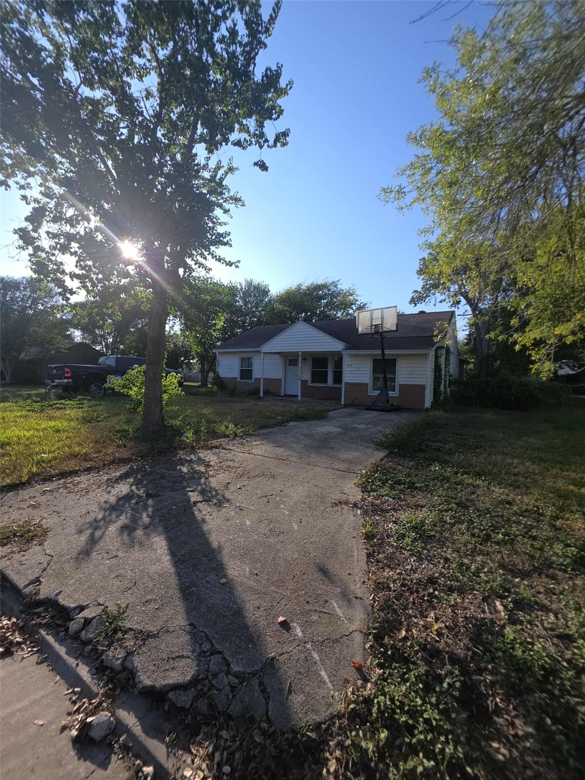 115 Bell Street Point Comfort, TX 77978 - Photo 3 of 24 a view of a house with a yard