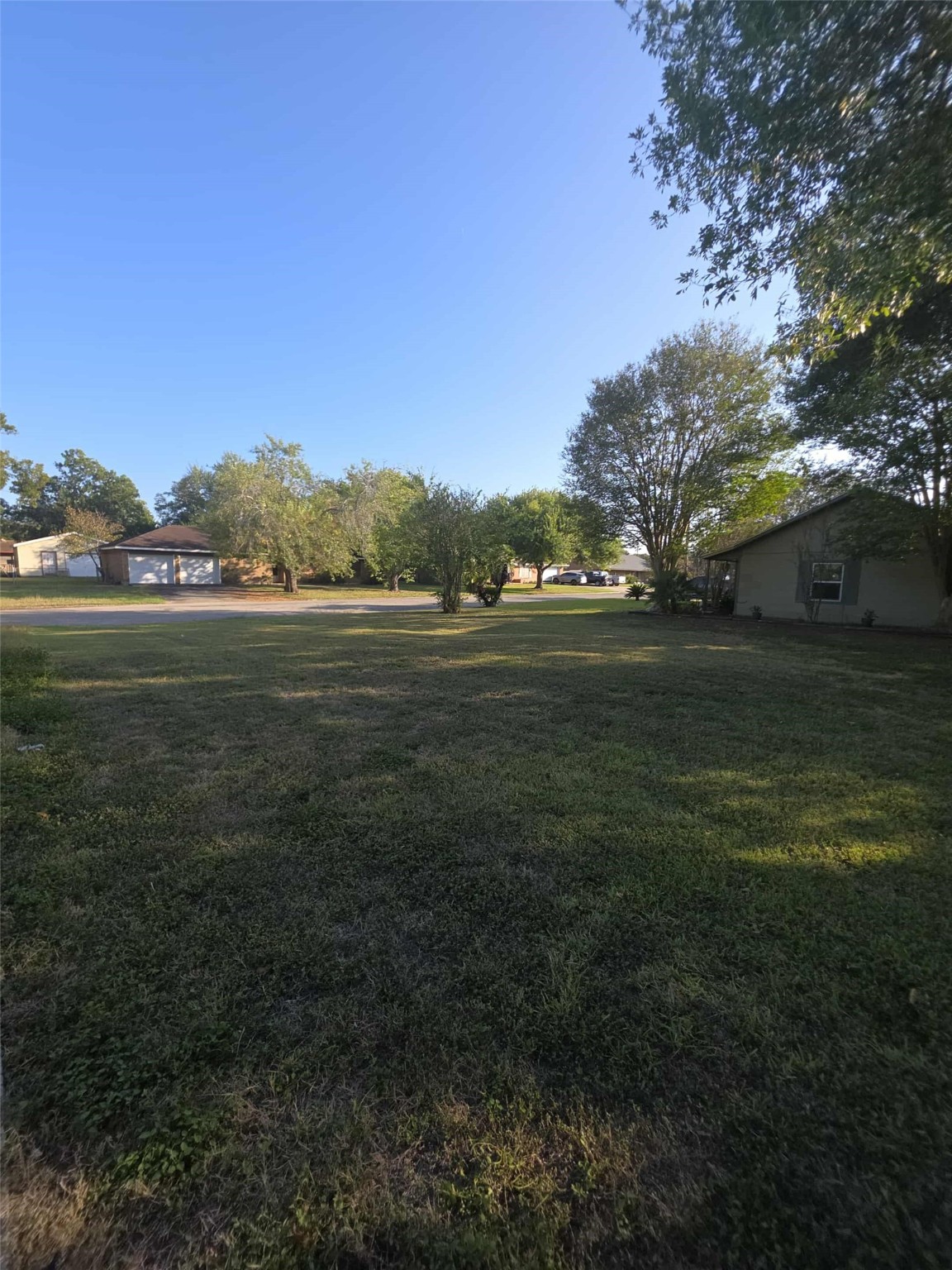 115 Bell Street Point Comfort, TX 77978 - Photo 6 of 24 a view of an outdoor space and a yard