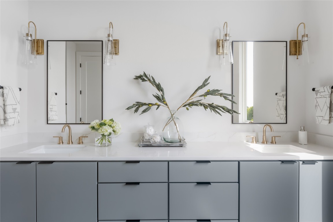 7809 Old Bee Caves Road, Unit 13 Austin, TX 78735 - Photo 16 of 30 a bathroom with a sink and mirror
