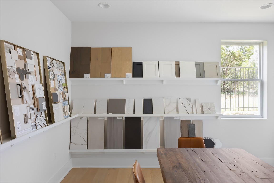 7809 Old Bee Caves Road, Unit 13 Austin, TX 78735 - Photo 3 of 30 a living room with stainless steel appliances furniture a fireplace and a large window