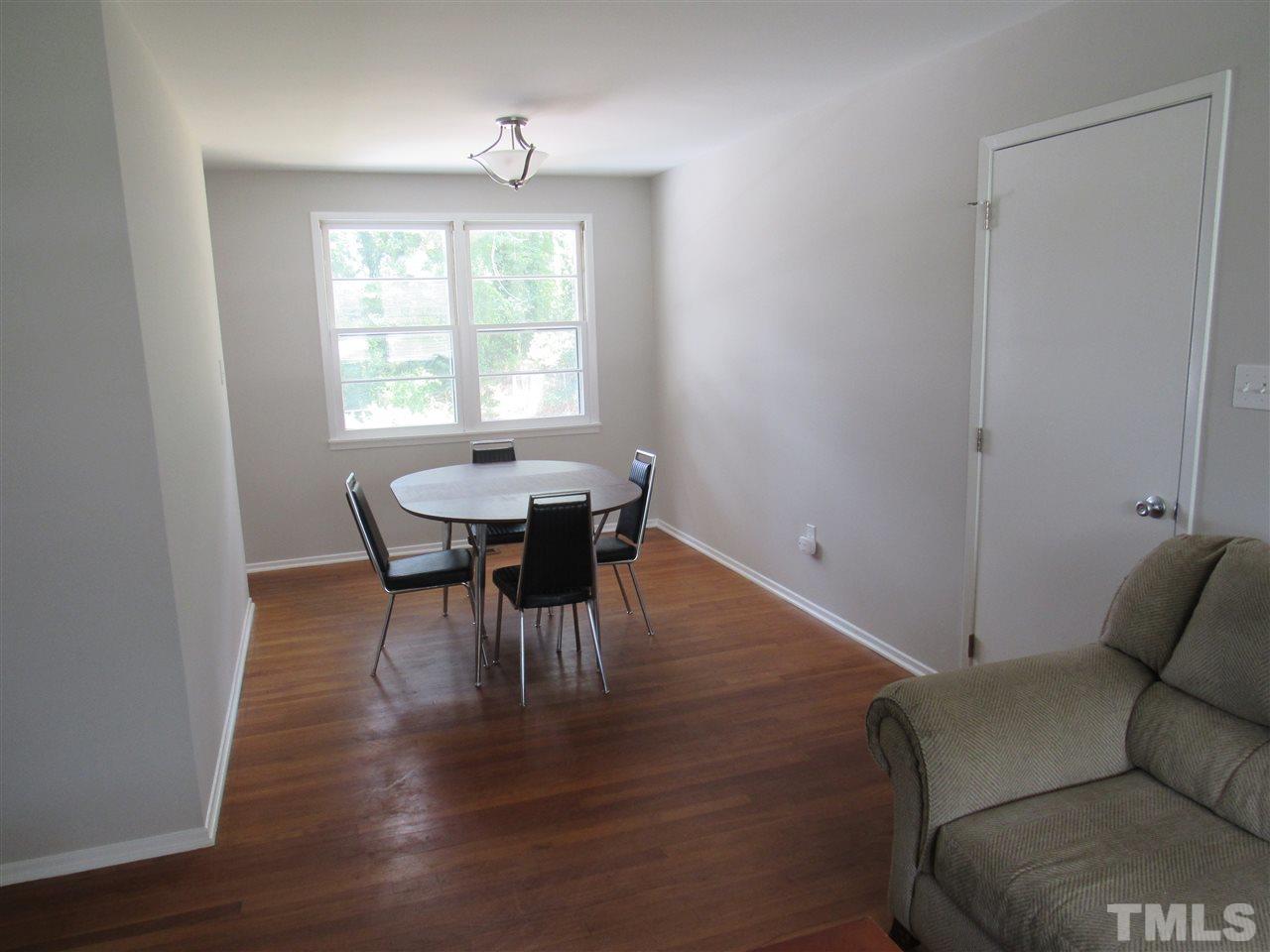 321 Quail Drive Raleigh, NC 27604 - Photo 6 of 25 a view of a livingroom and dining room