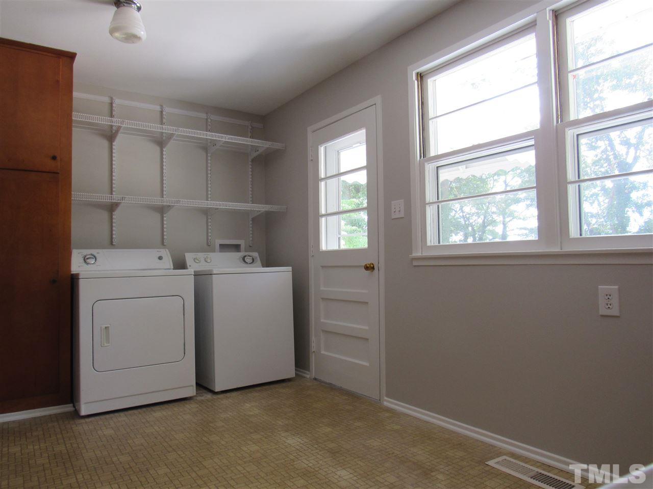 321 Quail Drive Raleigh, NC 27604 - Photo 9 of 25 a utility room with dryer and washer
