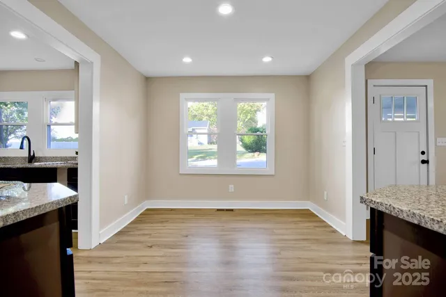 a view of kitchen and utility room