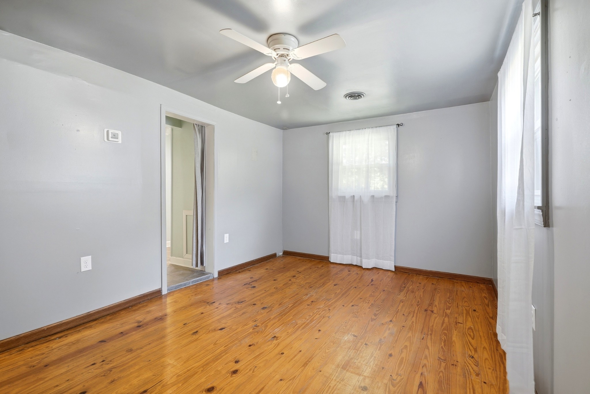 6471 Highway 161 Springfield, TN 37172 - Photo 30 of 57 wooden floor in an empty room with a window