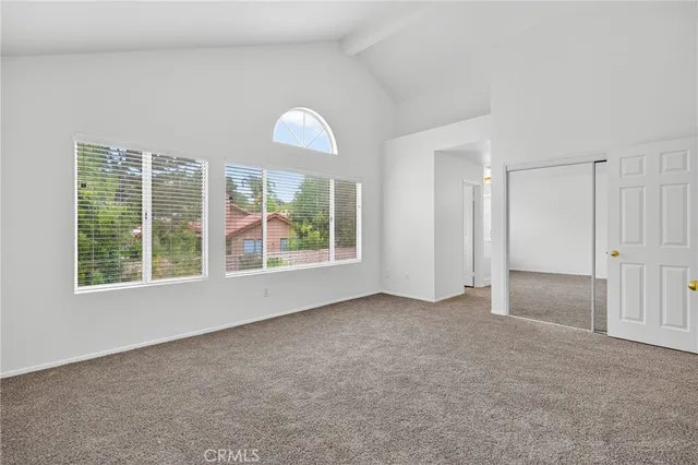 an empty room with a large window