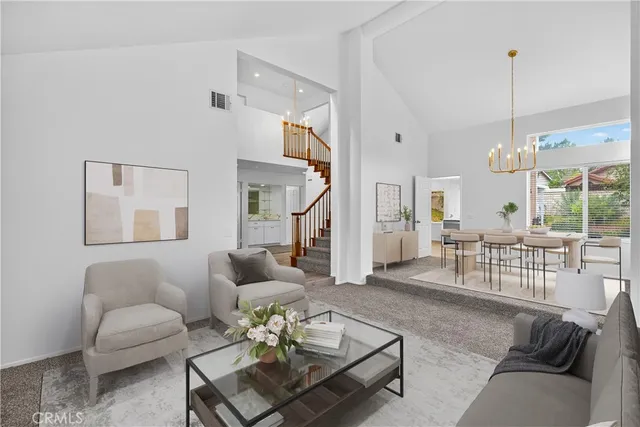 a living room with furniture or couch and a wooden floor