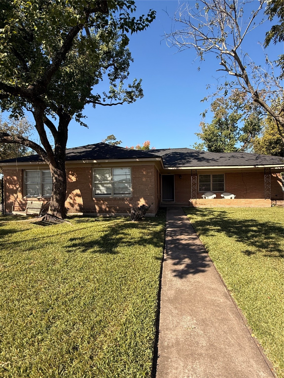 a view of a house with swimming pool