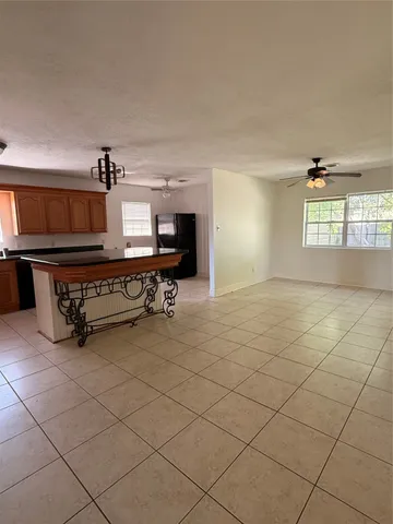 a view of a livingroom with furniture