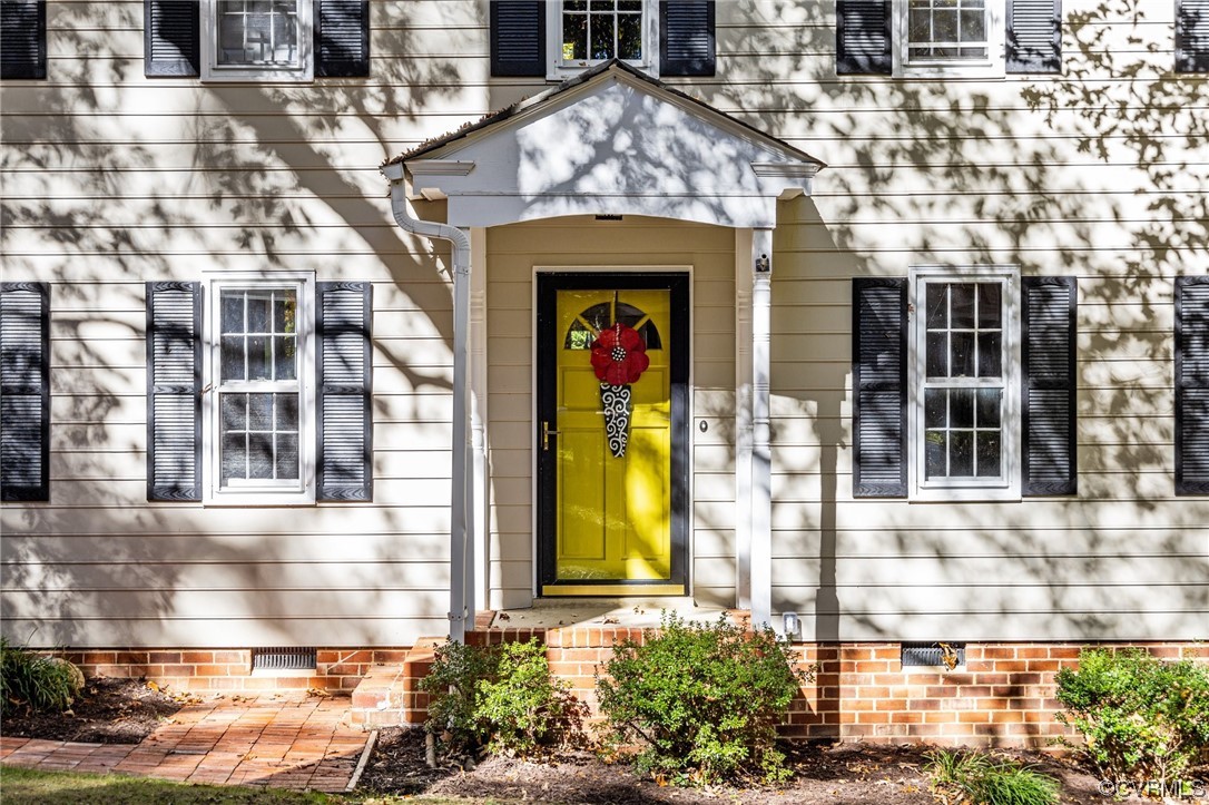 13206 Queensgate Road Midlothian, VA 23114 - Photo 2 of 42 a front view of a house with a yard