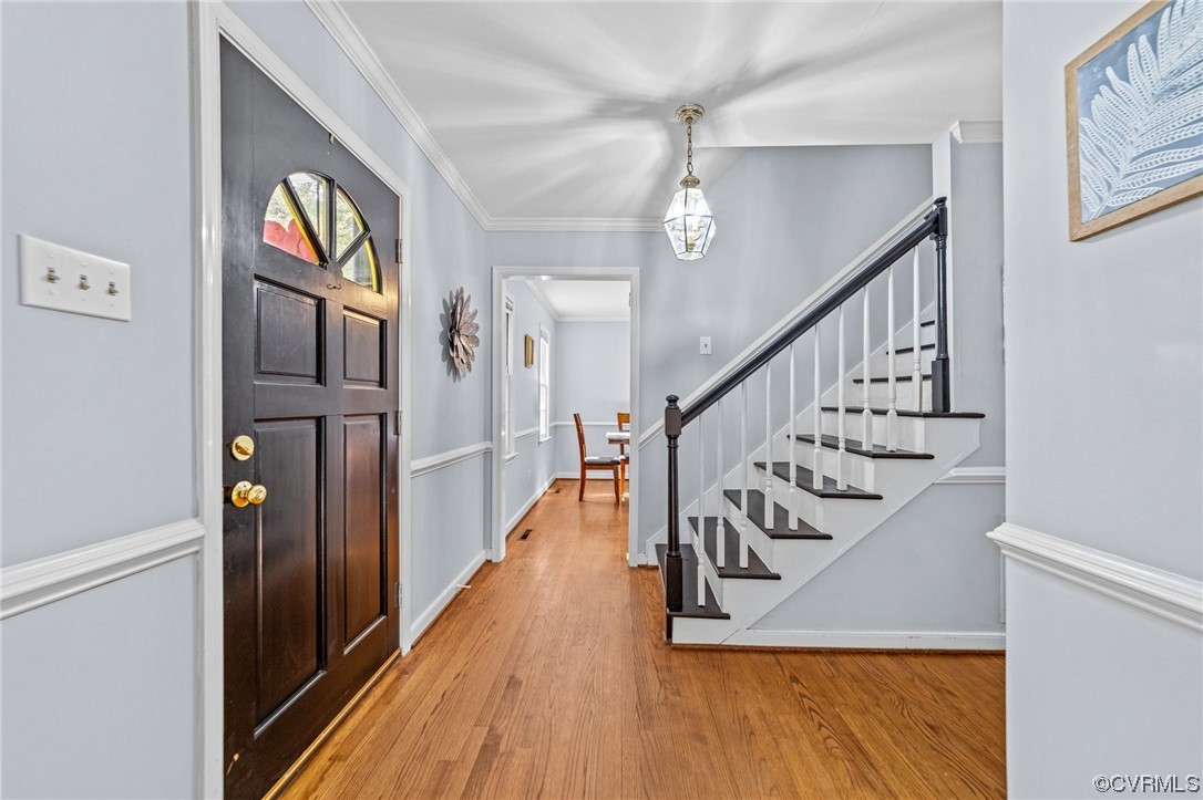 13206 Queensgate Road Midlothian, VA 23114 - Photo 35 of 42 a view of entryway and hall with wooden floor