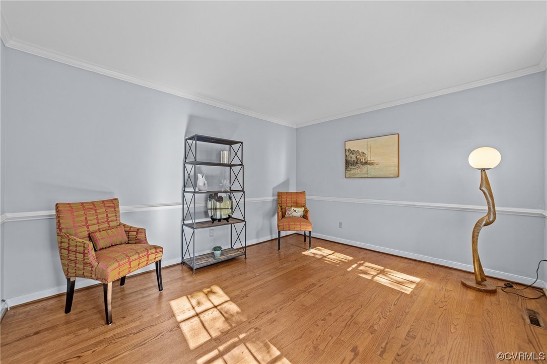 13206 Queensgate Road Midlothian, VA 23114 - Photo 36 of 42 a room with furniture and wooden floor