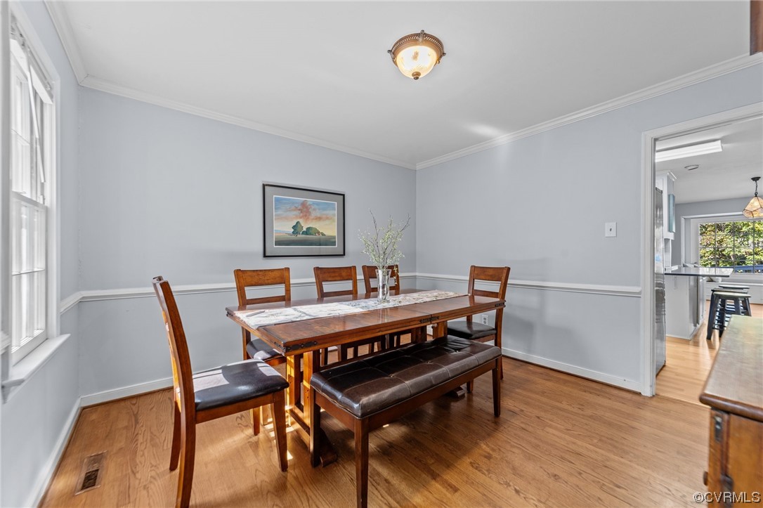 13206 Queensgate Road Midlothian, VA 23114 - Photo 38 of 42 a view of a dining room with furniture and wooden floor