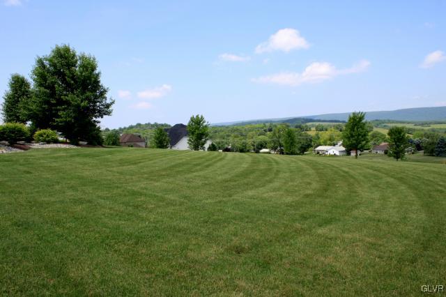 205 East Dell Road Bath, PA 18014 - Photo 13 of 14 a view of a grassy field with an trees