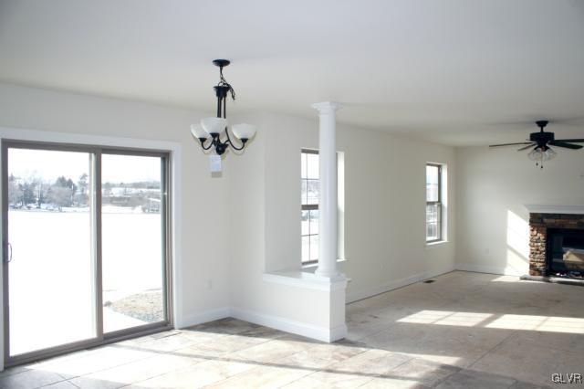 205 East Dell Road Bath, PA 18014 - Photo 4 of 14 a view of a livingroom with a chandelier fan and windows