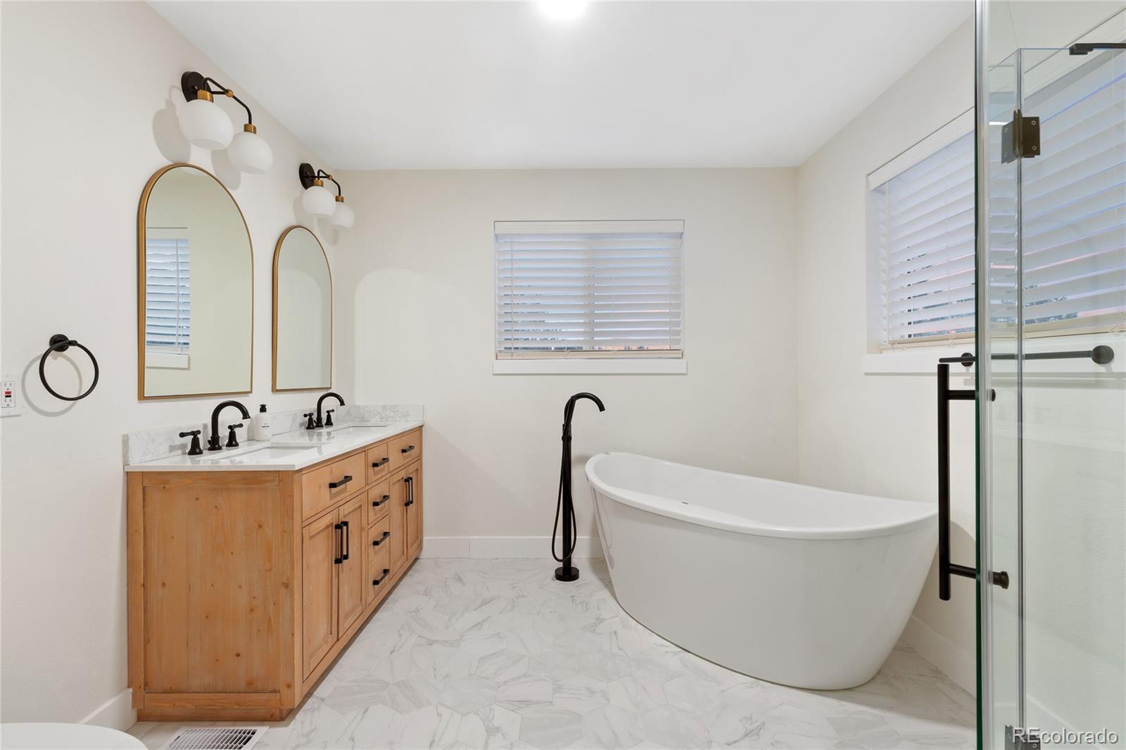 29 South Pine Drive Bailey, CO 80421 - Photo 13 of 27 a bathroom with a bathtub and shower