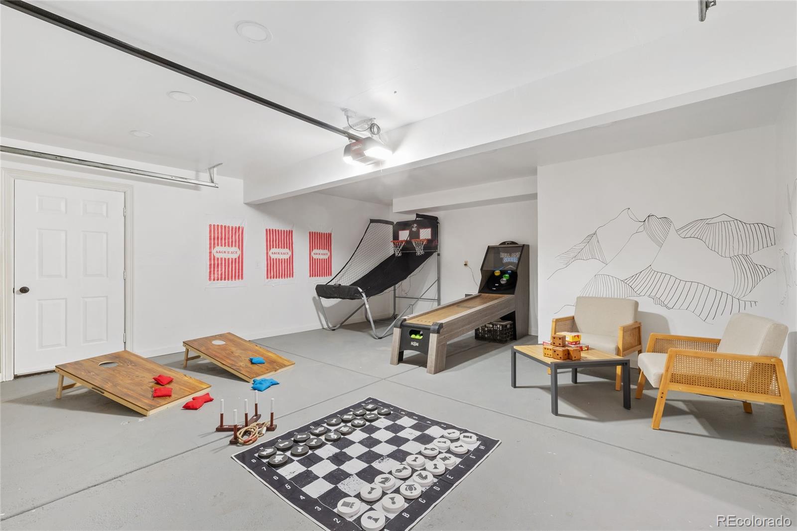 29 South Pine Drive Bailey, CO 80421 - Photo 24 of 27 a bedroom with furniture and a rug