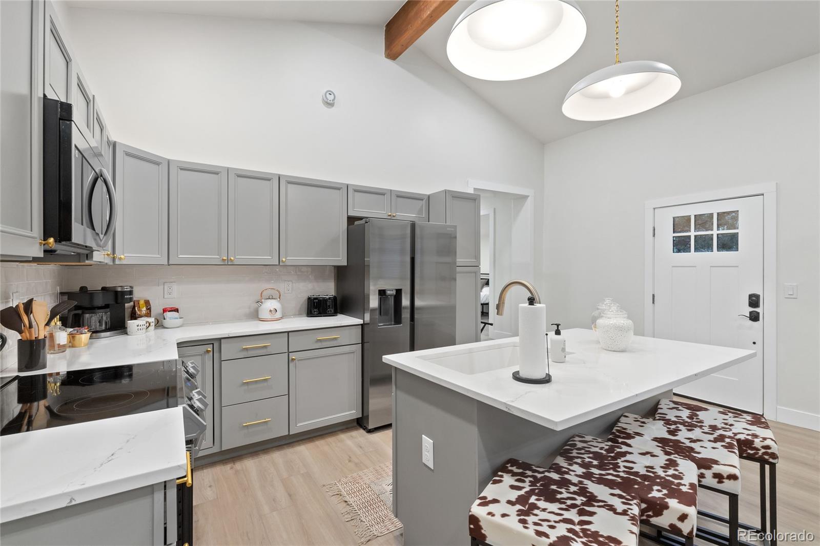 29 South Pine Drive Bailey, CO 80421 - Photo 8 of 27 a kitchen with a sink cabinets and appliances