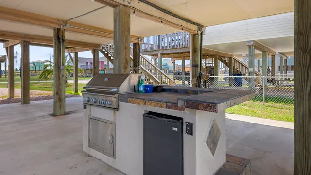 a living room with a table and chairs