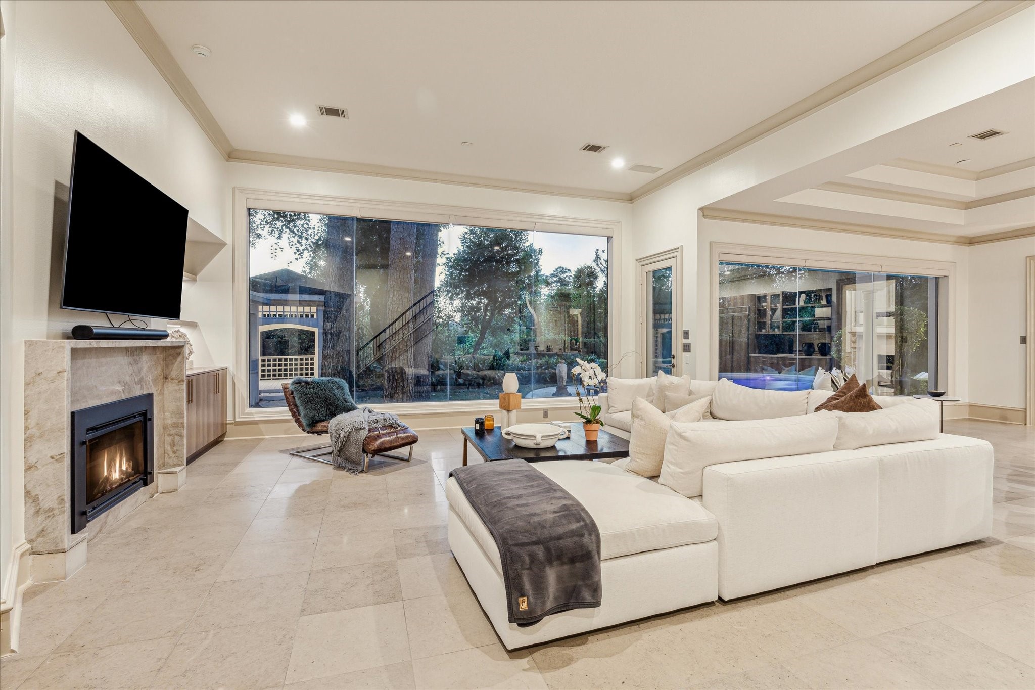 918 Huntington Cove Houston, TX 77063 - Photo 17 of 50 A family room is the heart of the home. Designed to be a comfortable and versatile space for the whole family to gather, enjoy and relax.