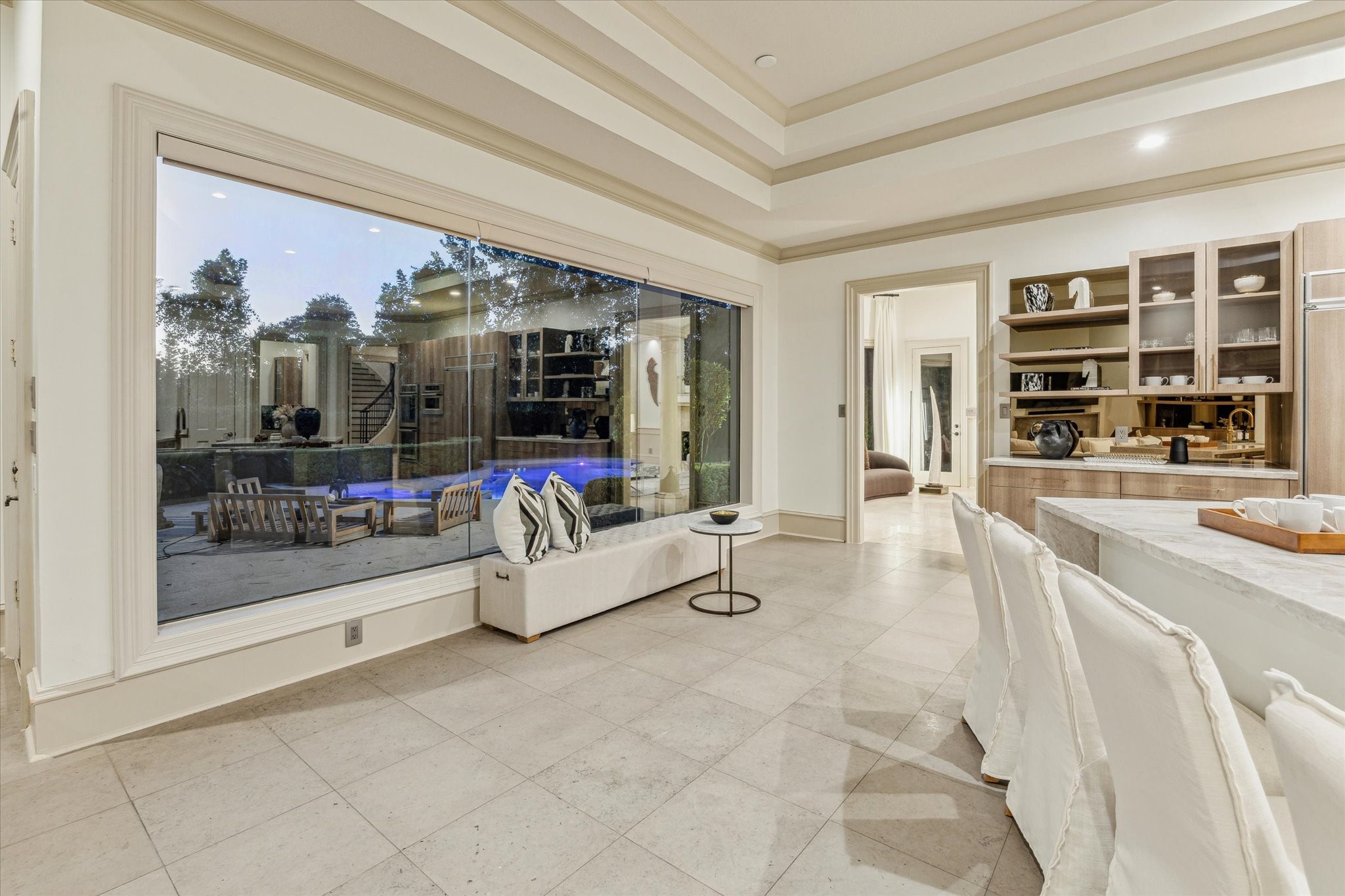 918 Huntington Cove Houston, TX 77063 - Photo 27 of 50 An inviting window seat or a possible breakfast dining nook highlighting the natural light and emphasizing the view which is the primary focus of the area.