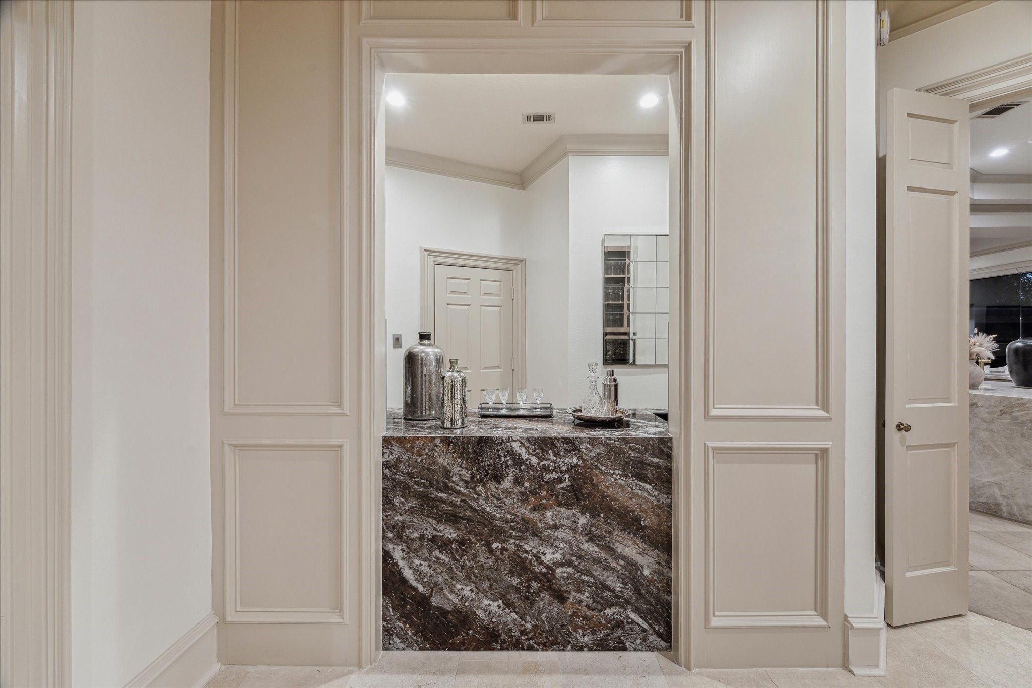 918 Huntington Cove Houston, TX 77063 - Photo 34 of 50 Stunning wet bar area visible upon foyer entry and is complimented by a nearby wine closet