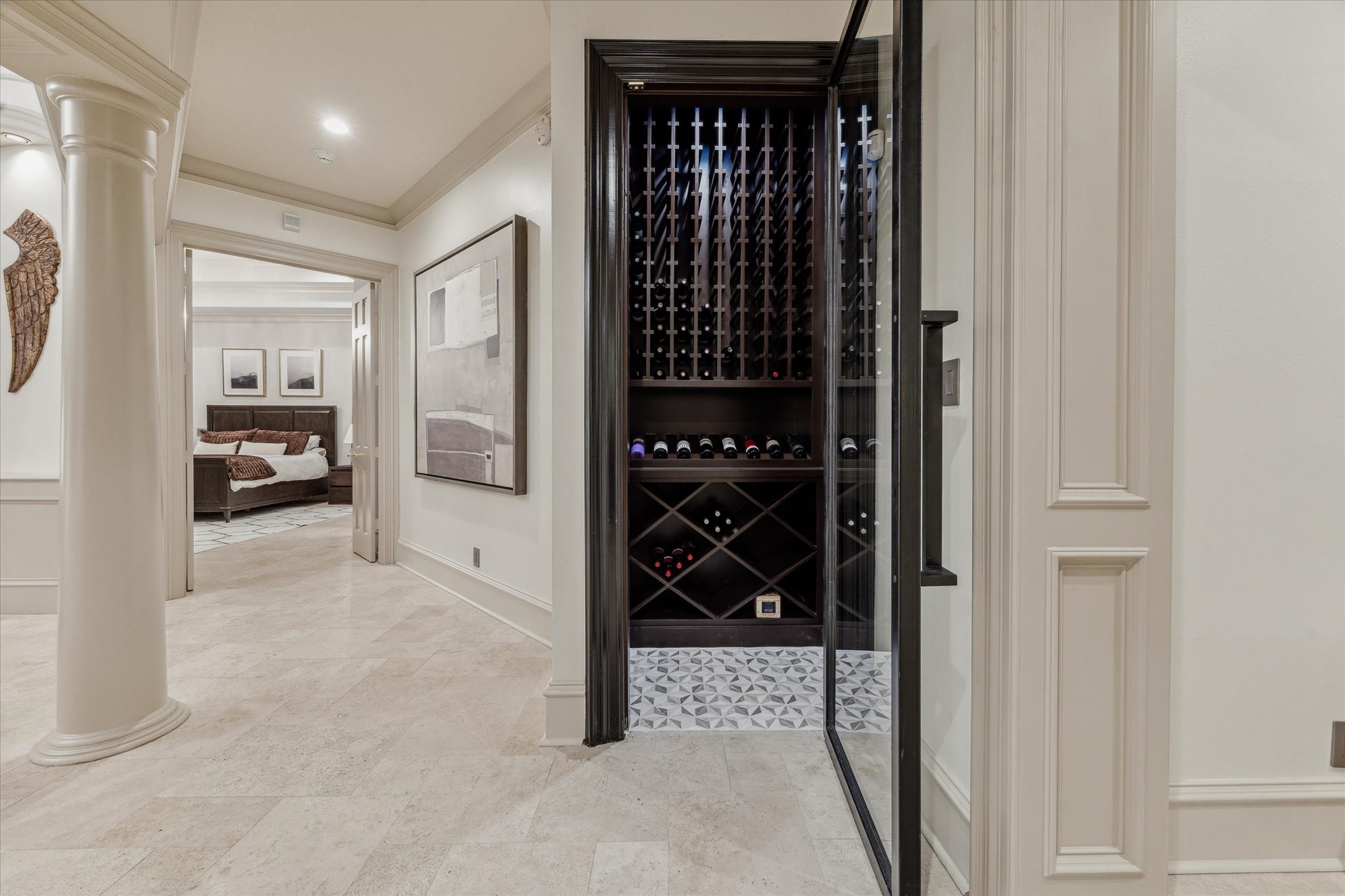 918 Huntington Cove Houston, TX 77063 - Photo 35 of 50 Elevate you private collection with this elegant wine closet, the perfect sanctuary for the wine connoisseur.