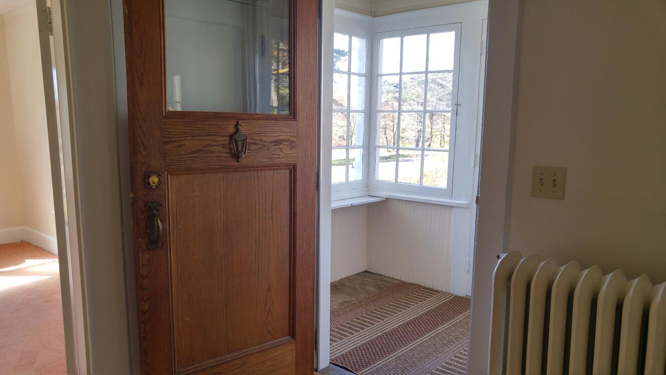 397 Old County Road Rockland, ME 04841 - Photo 9 of 37 Front door and sun porch.