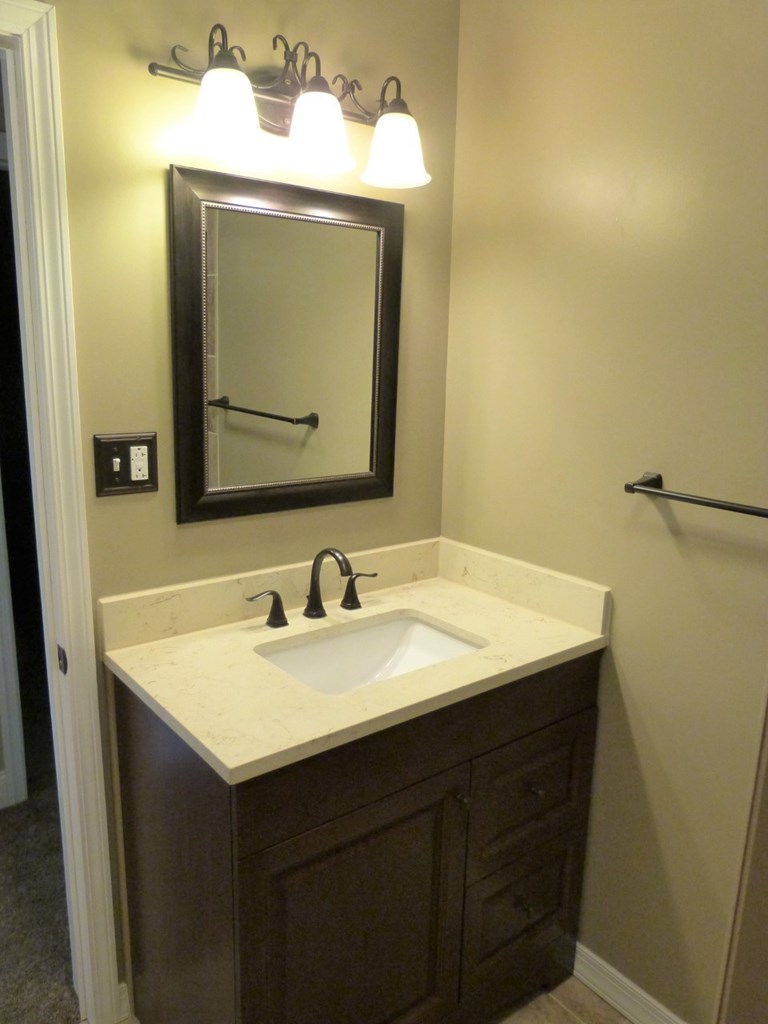 1463 Pittsburgh Road Franklin, PA 16323 - Photo 12 of 32 a bathroom with a sink and a mirror