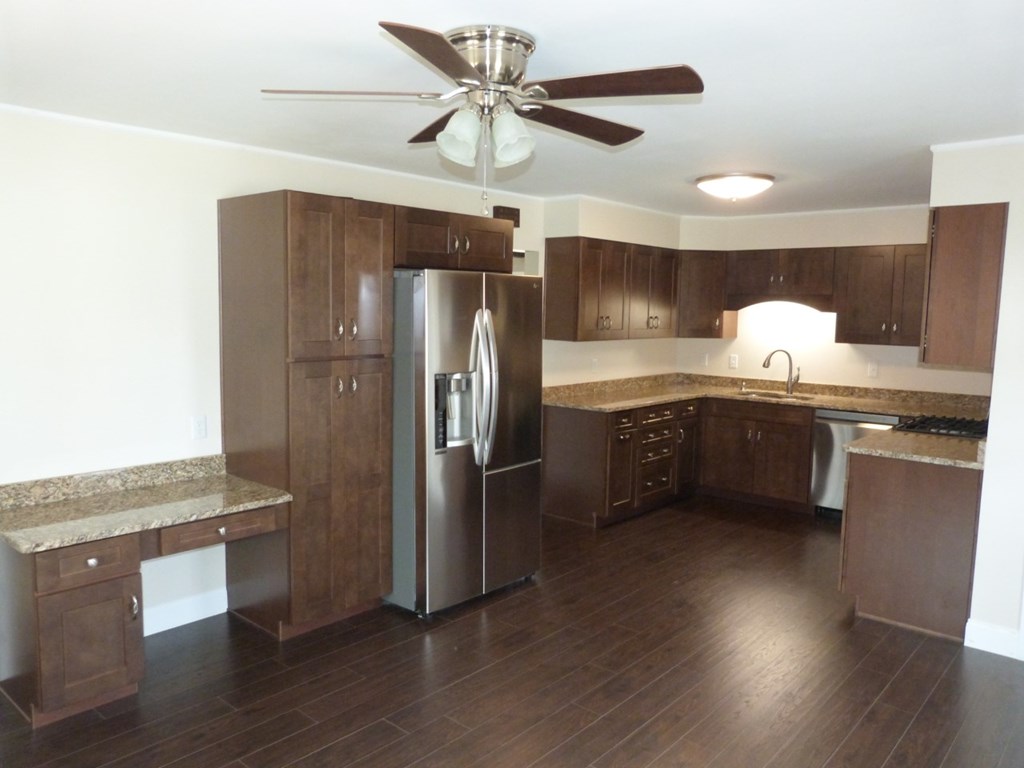 1463 Pittsburgh Road Franklin, PA 16323 - Photo 5 of 32 a kitchen with stainless steel appliances granite countertop a refrigerator a sink and a stove