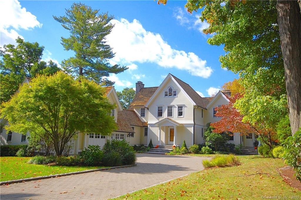 2641 Bronson Road Fairfield, CT 06824 - Photo 1 of 1 a front view of a house with a yard