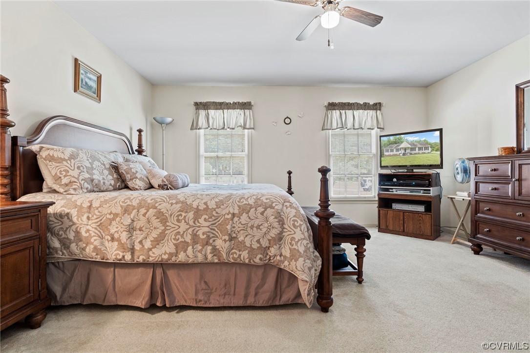 3963 Doe Run Road Hopewell, VA 23860 - Photo 21 of 48 a bedroom with a bed and a television