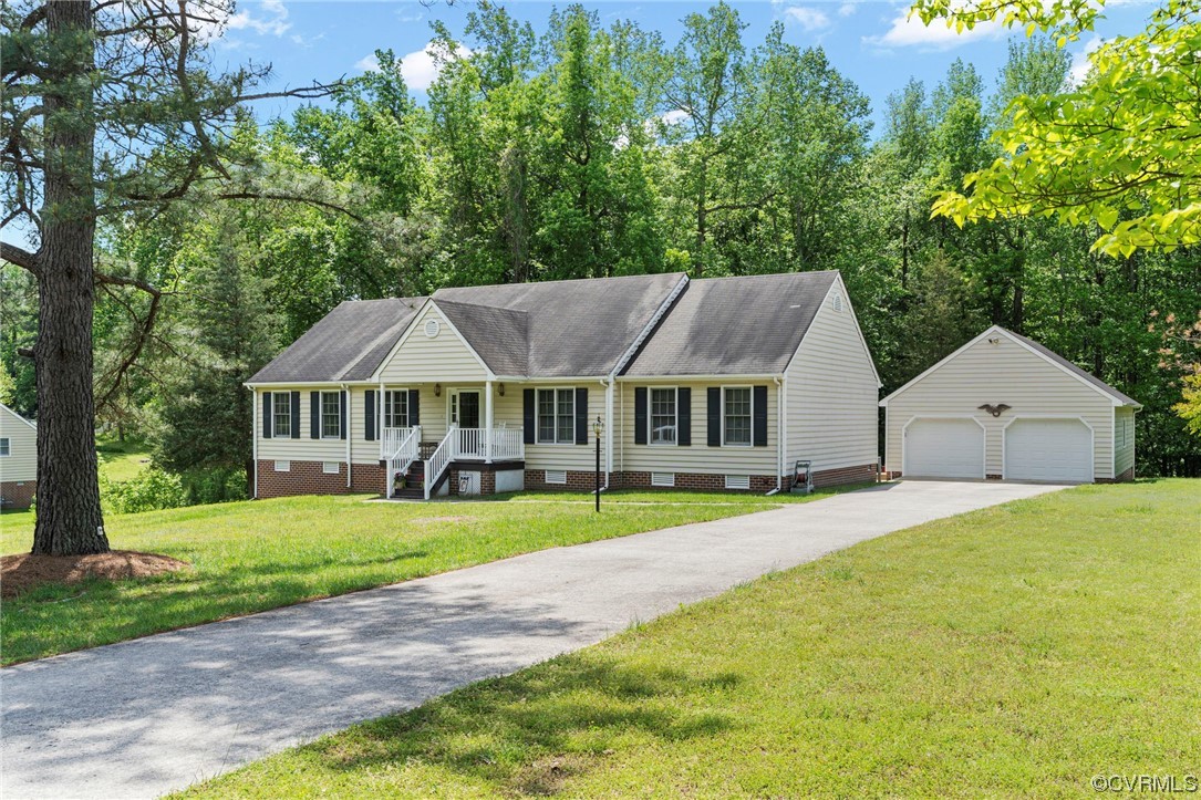 3963 Doe Run Road Hopewell, VA 23860 - Photo 3 of 48 a view of house with garden and trees