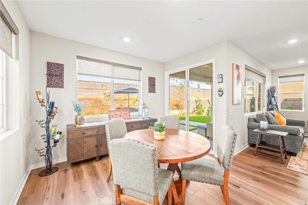 1281 Roots Way Rancho Mission Viejo, CA 92694 - Photo 20 of 75 a view of a dining room with furniture window and outside view