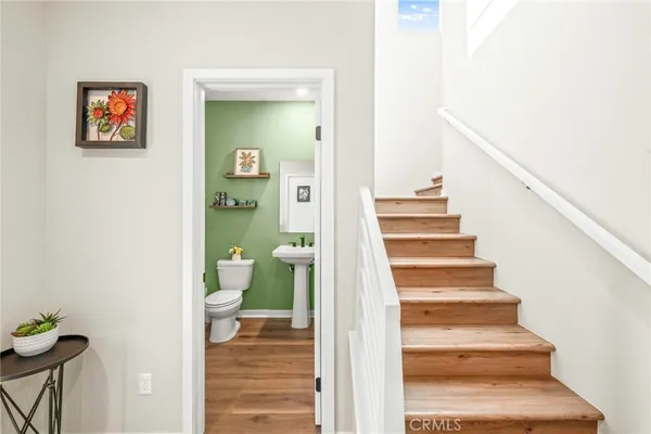a bathroom with a shower and a glass door