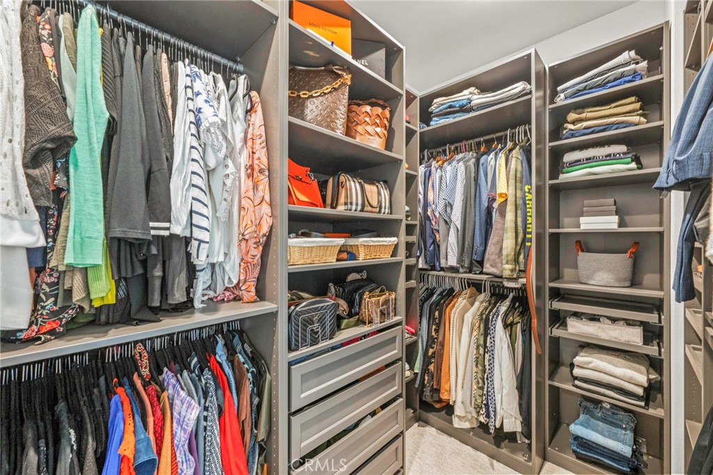 1281 Roots Way Rancho Mission Viejo, CA 92694 - Photo 37 of 75 a view of walk in closet with clothes and shoes