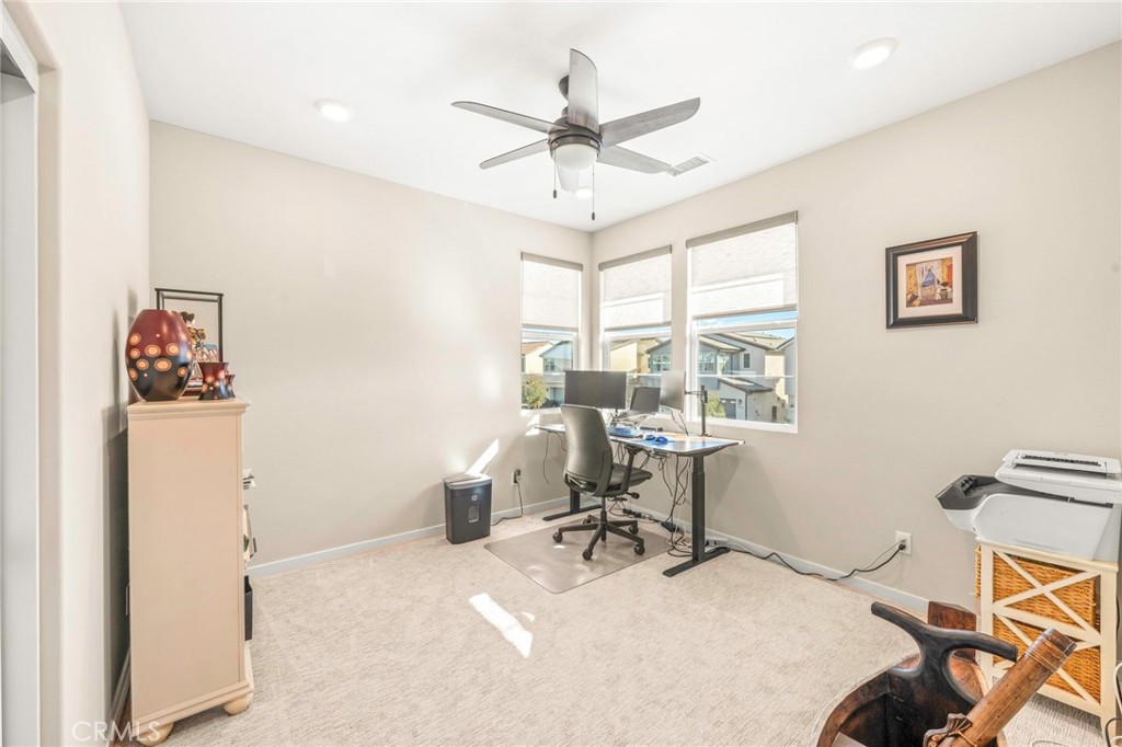 1281 Roots Way Rancho Mission Viejo, CA 92694 - Photo 40 of 75 a view of a workspace with furniture and a window