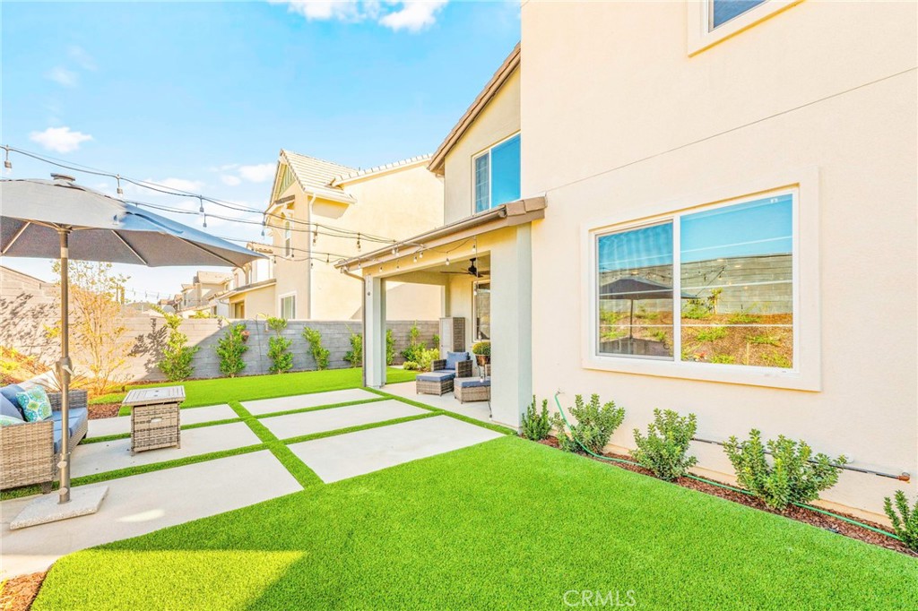 1281 Roots Way Rancho Mission Viejo, CA 92694 - Photo 46 of 75 a view of a backyard with a garden and plants