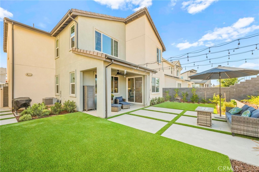 1281 Roots Way Rancho Mission Viejo, CA 92694 - Photo 5 of 75 a view of a house with backyard porch and sitting area