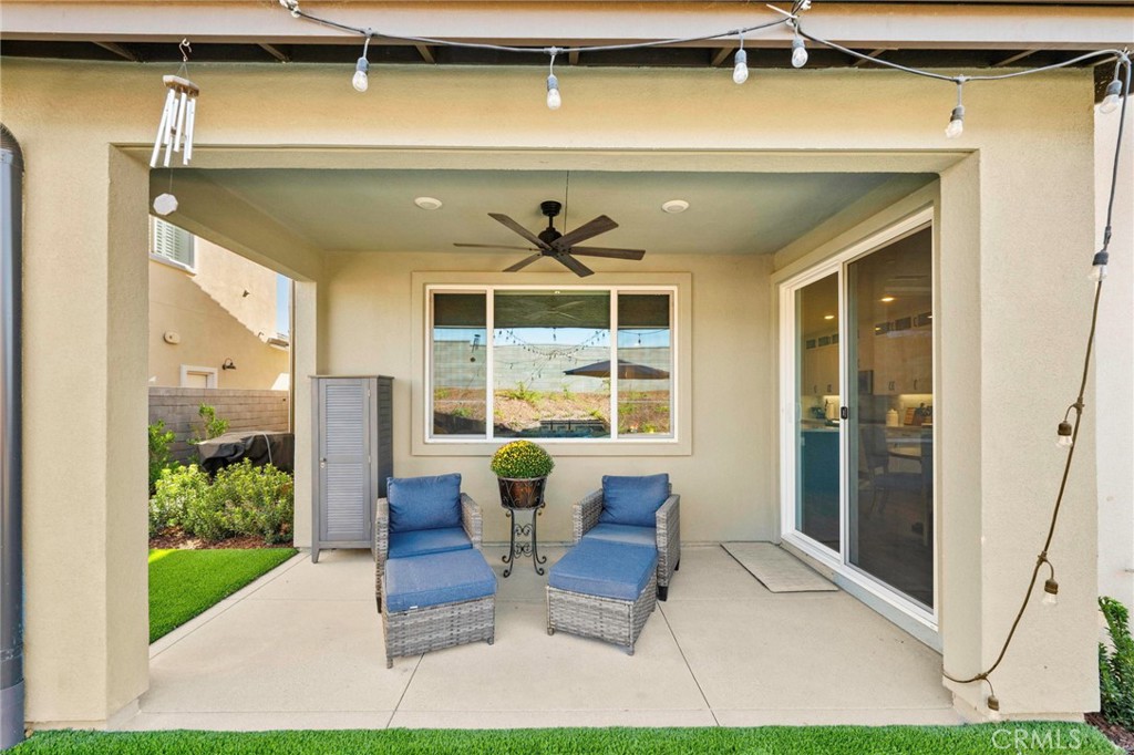1281 Roots Way Rancho Mission Viejo, CA 92694 - Photo 51 of 75 a front view of a house with outdoor seating and a potted plant
