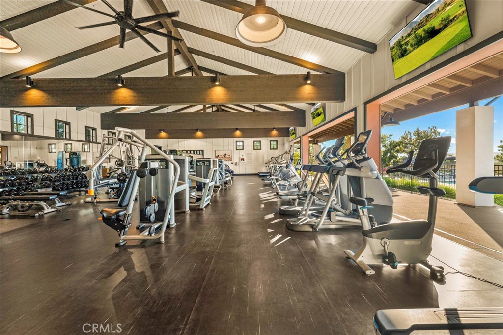 1281 Roots Way Rancho Mission Viejo, CA 92694 - Photo 8 of 75 a view of a room with gym equipment