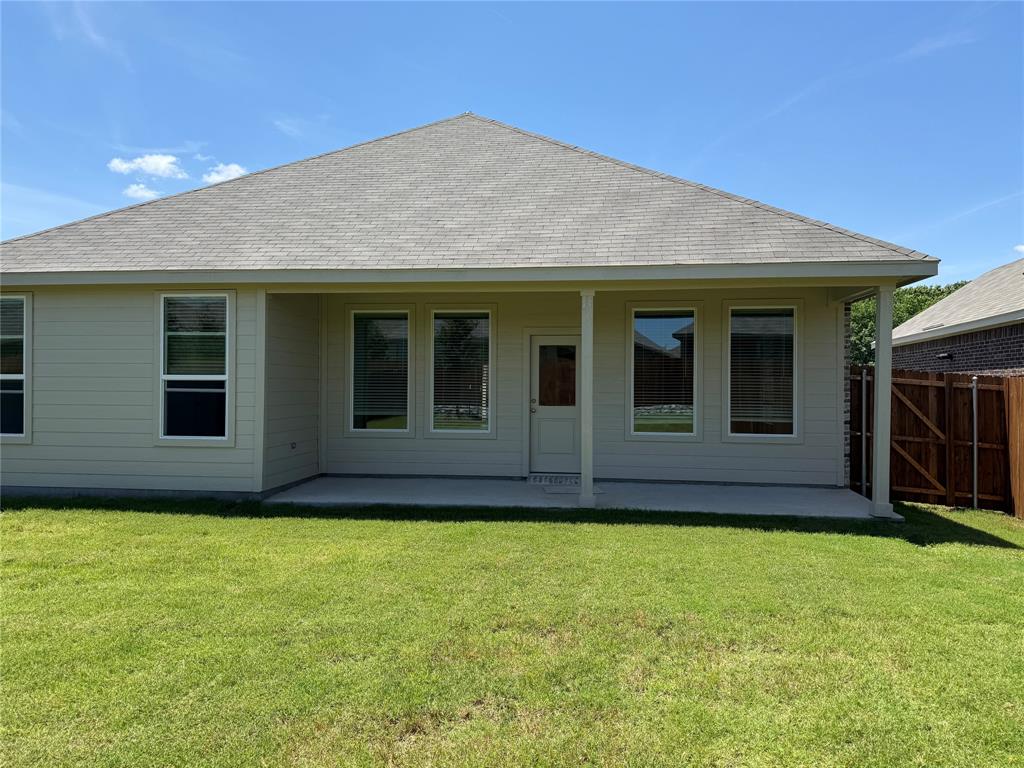 6420 Ponderosa Pne Road McKinney, TX 75071 - Photo 3 of 10 Rear view of house with a patio area and roof with shingles
