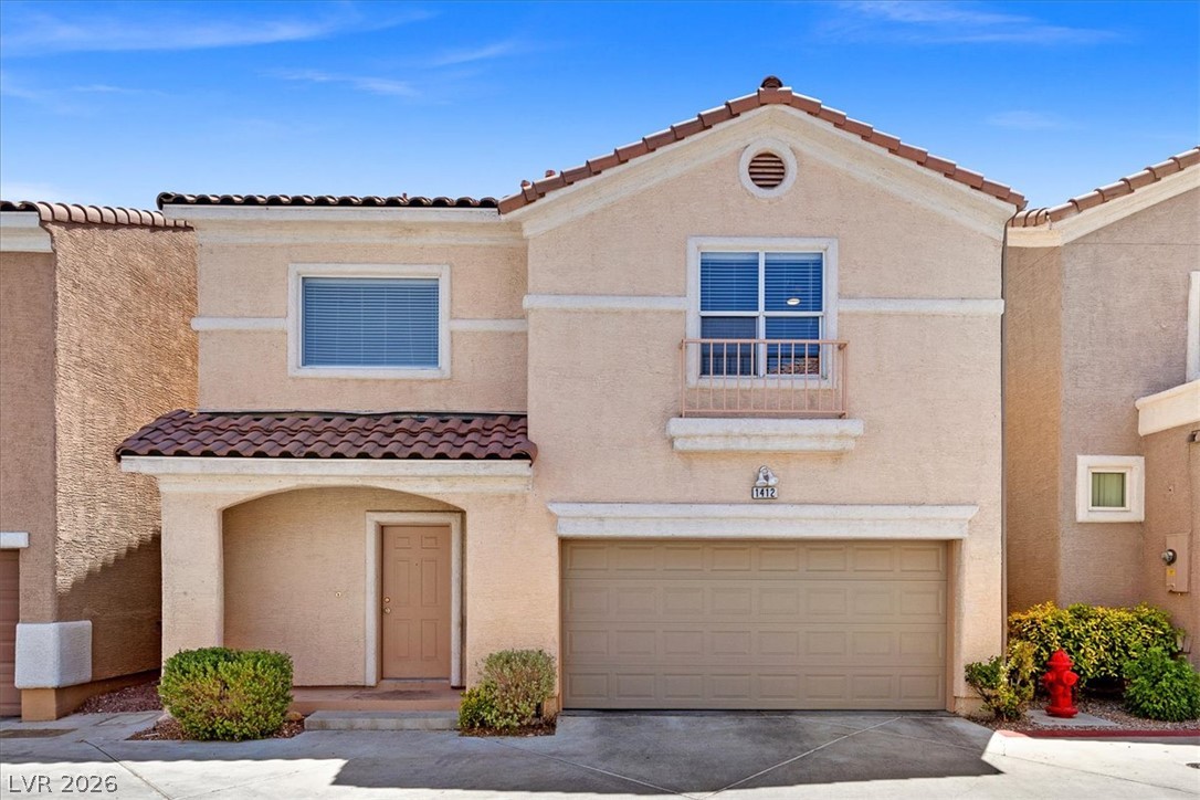 1412 Beaver Spring Street Las Vegas, NV 89128 - Photo 1 of 20 A terracotta-tiled roof crowns this appealing stucco residence with a spacious garage.
