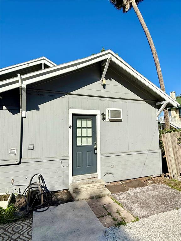 a view of a garage with a sink and wooden roof