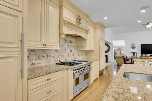 a large bathroom with a double vanity sink a mirror and a shower