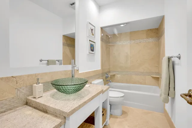 an aerial view of residential house with outdoor space and lake view