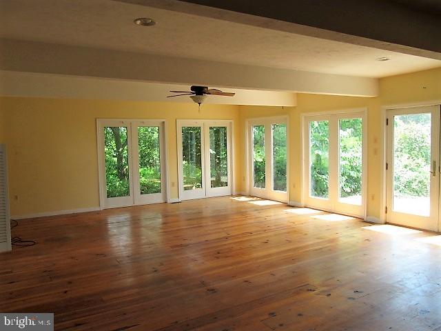 807 Fish And Game Road Littlestown, PA 17340 - Photo 13 of 50 1st floor large family room, leading out to patio