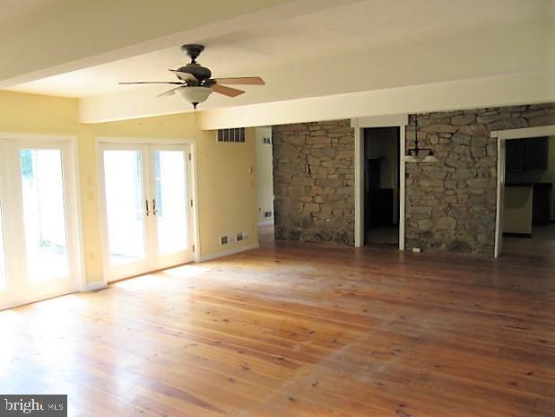 807 Fish And Game Road Littlestown, PA 17340 - Photo 14 of 50 1st floor large family room, leading out to patio