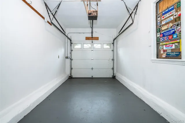 a view of a hallway with stairs