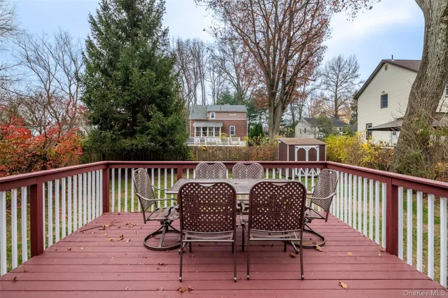 a view of a deck with furniture