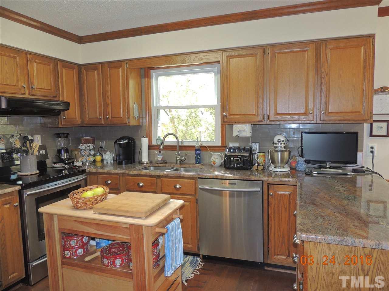 3206 Dixon Road Durham, NC 27707 - Photo 8 of 20 WOOD FLOORS AND LARGE PANTRY